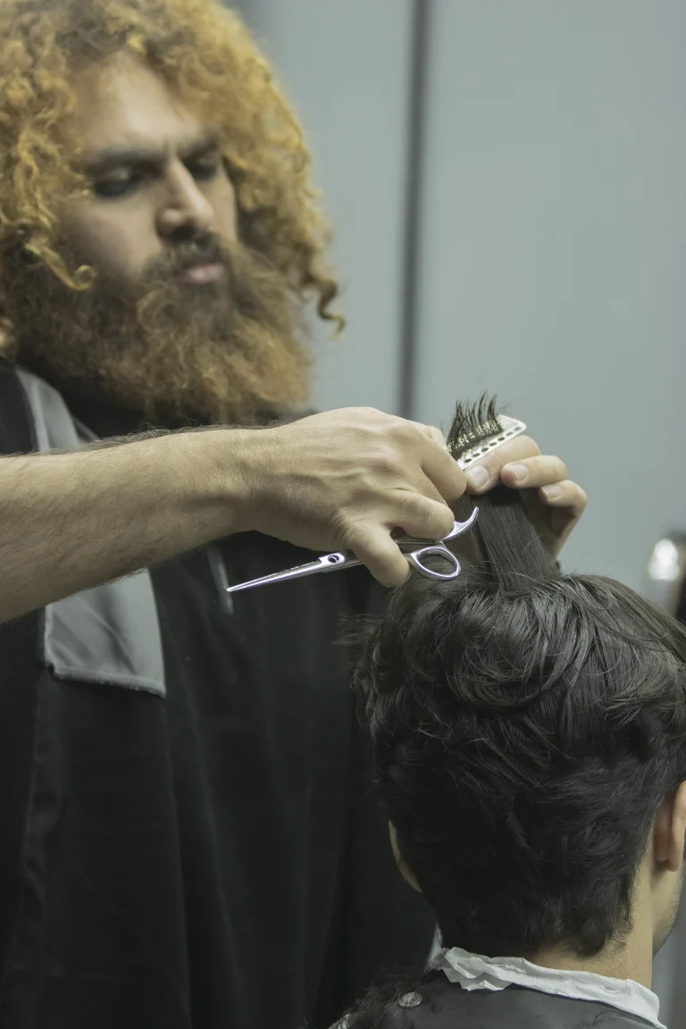 Haircutting at a barbershop