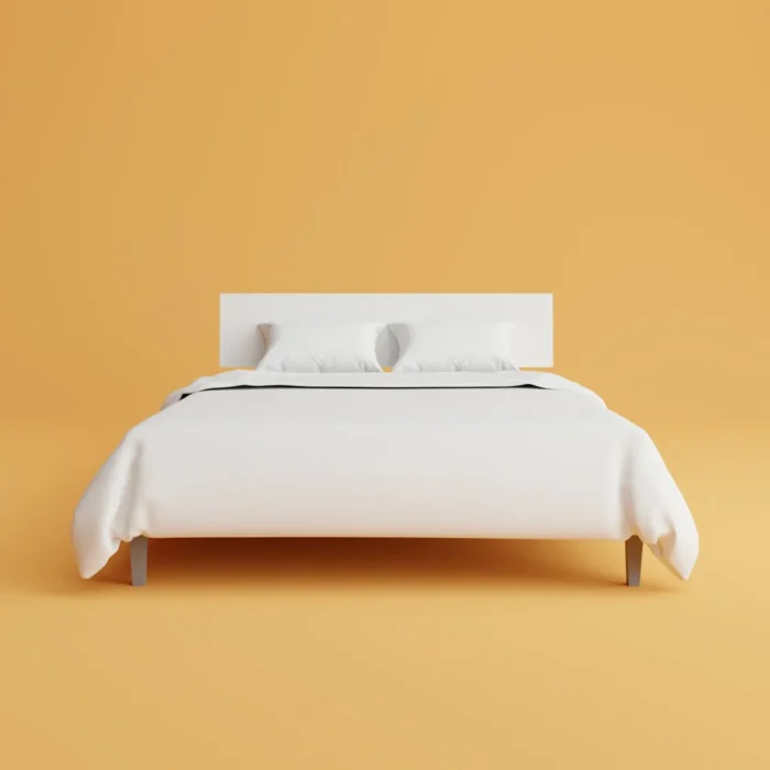 Bed with white sheets, representing mattress protector deals
